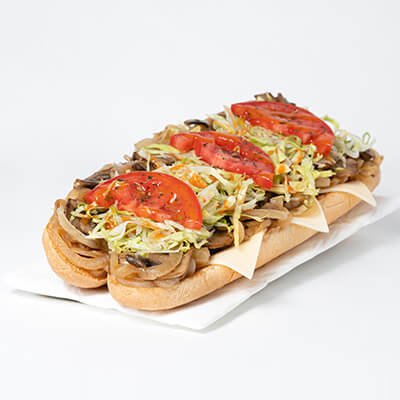 Submarine sandwich with cheese, peppers, onions, mushrooms, lettuce, tomatoes, on a white background