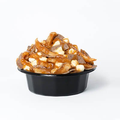 Classic poutine, fries, cheese and gravy, with gyros meat, served in a black bowl, on a white background