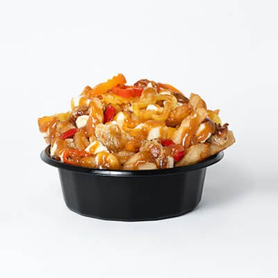 Classic poutine, fries, cheese and gravy, with chicken and peppers, served in a black bowl, on a white background