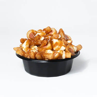 Classic poutine, fries, cheese and gravy and pogo pieces, served in a black bowl, on a white background